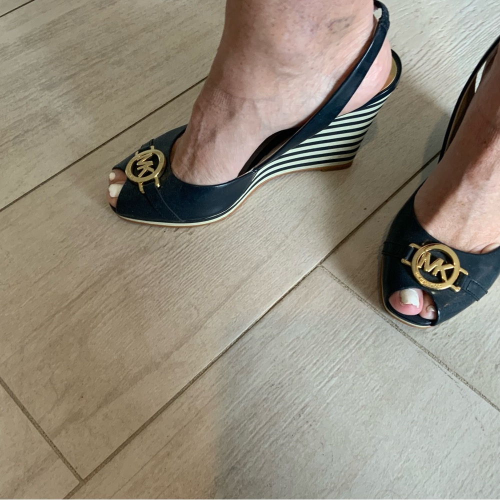 Michael Kors Navy and White Striped Wedges with MK in gold on top of shoe